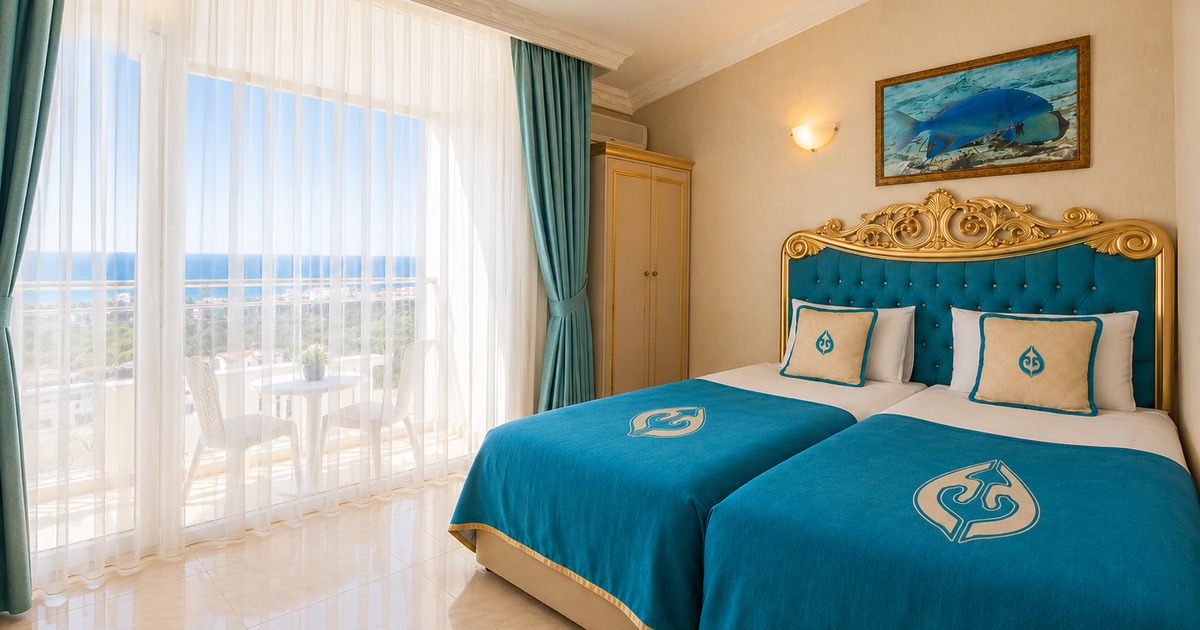 Twin room with sea view balcony and ornate gold headboard, Kemer Turkey